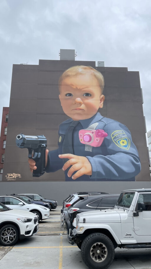 Baby with a handgun
