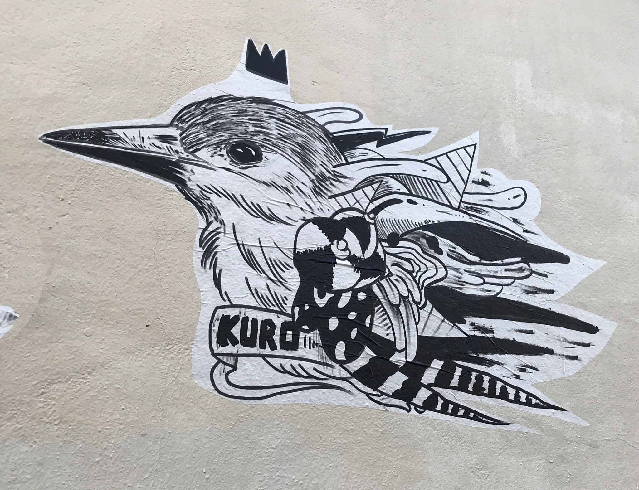 Kuro bird collage by Kuro - Street Art Cities