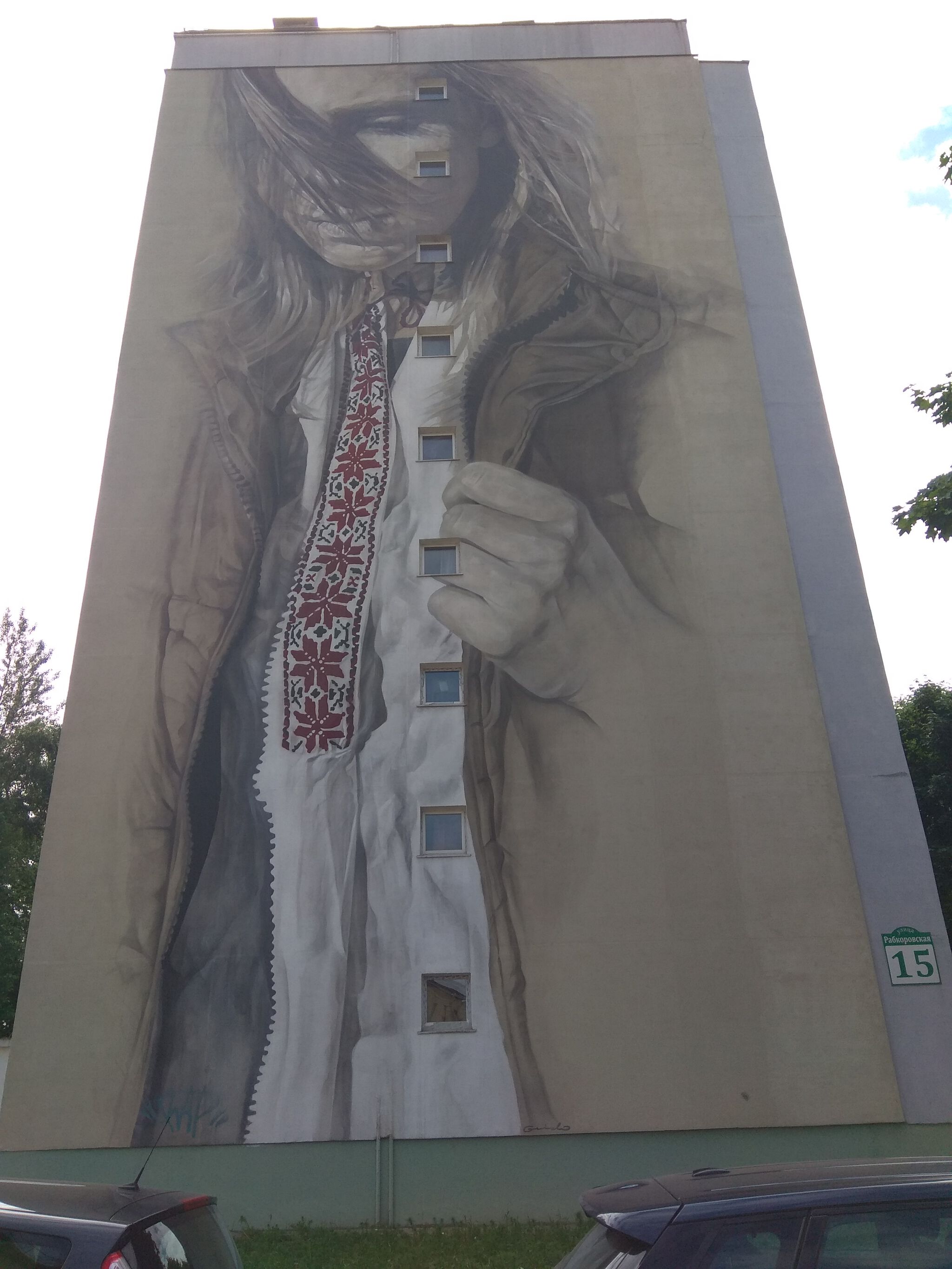 Guido van Helten&mdash;Girl in a national shirt