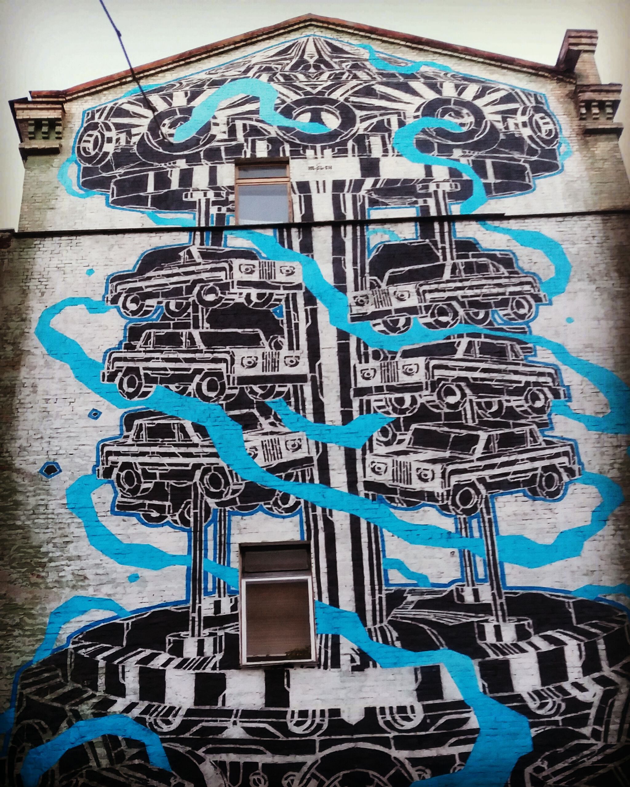 M-City&mdash;The monochrom mural, carousel of cars