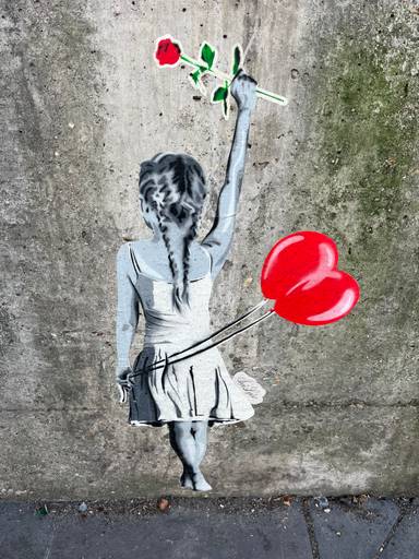 Little Girl with a rose and balloons